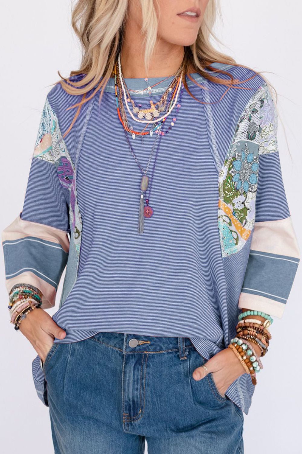 Feel your individuality showcased as you wear PERFECT boho top! This oversized 3/4 sleeve has vintage-inspired floral patches and a blend of vibrant colors. This oversized top is made for those who crave comfort and creativity. The oversized stripes and vintage style blooms create a one-of-a-kind, artsy vibe that’s as laid-back and free-spirited as you are. Whether you’re lounging or adventuring, in this top you can feel confident, carefree, and ready to embrace whatever comes your way!