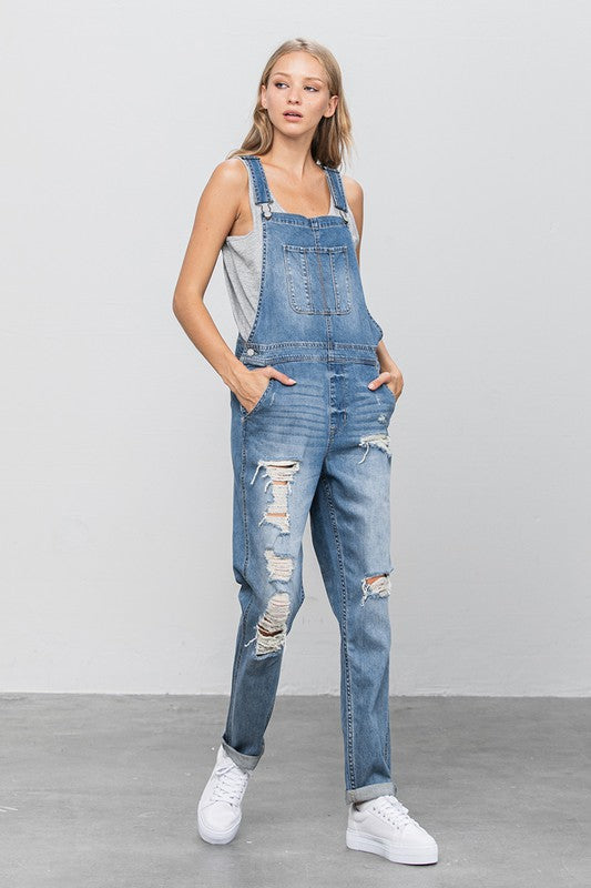 Denim Lab- Patch Pocket Ripped Denim Overalls -Day to Night- Season-to Season. So essential and always timeless, these overalls are a must-have that your wardrobe has been waiting for! These distressed overalls have vintage appeal and for a casual outing you can wear just about anything! Worried it is too laid back? To take it from day to night simply dress up with a polished top, fitted sweater, or structured blazer with heels or ankle boots! By the way, straps are adjustable!