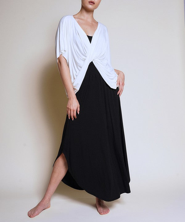 Experience ultimate comfort and effortless style with our luxurious Organic Bamboo Maxi Skirt. Crafted from a dreamy blend of organic bamboo and soft, stretchy spandex, this skirt offers an incredible drape and moves with you, offering a flattering fit that feels as good as it looks. The smocked elastic waist hugs gently, giving you all-day ease, while the flowing silhouette adds a graceful, boho touch to any outfit. This is a savvy choice for those who are eco-friendly or have skin conditions.