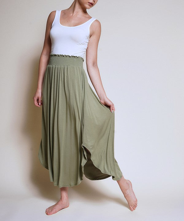 Experience ultimate comfort and effortless style with our luxurious Organic Bamboo Maxi Skirt. Crafted from a dreamy blend of organic bamboo and soft, stretchy spandex, this skirt offers an incredible drape and moves with you, offering a flattering fit that feels as good as it looks. The smocked elastic waist hugs gently, giving you all-day ease, while the flowing silhouette adds a graceful, boho touch to any outfit. This is a savvy choice for those who are eco-friendly or have skin conditions.