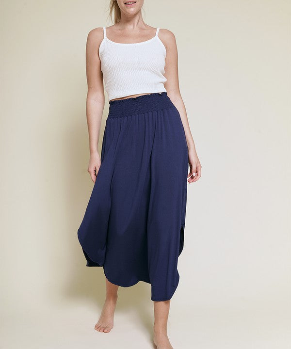 Experience ultimate comfort and effortless style with our luxurious Organic Bamboo Maxi Skirt. Crafted from a dreamy blend of organic bamboo and soft, stretchy spandex, this skirt offers an incredible drape and moves with you, offering a flattering fit that feels as good as it looks. The smocked elastic waist hugs gently, giving you all-day ease, while the flowing silhouette adds a graceful, boho touch to any outfit. This is a savvy choice for those who are eco-friendly or have skin conditions.