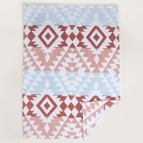 This blanket is the definition of cozy! It's warm and soft, perfect for snuggling up with on a chilly night. Great for gifts too! The rust colors pair well with the other colors!