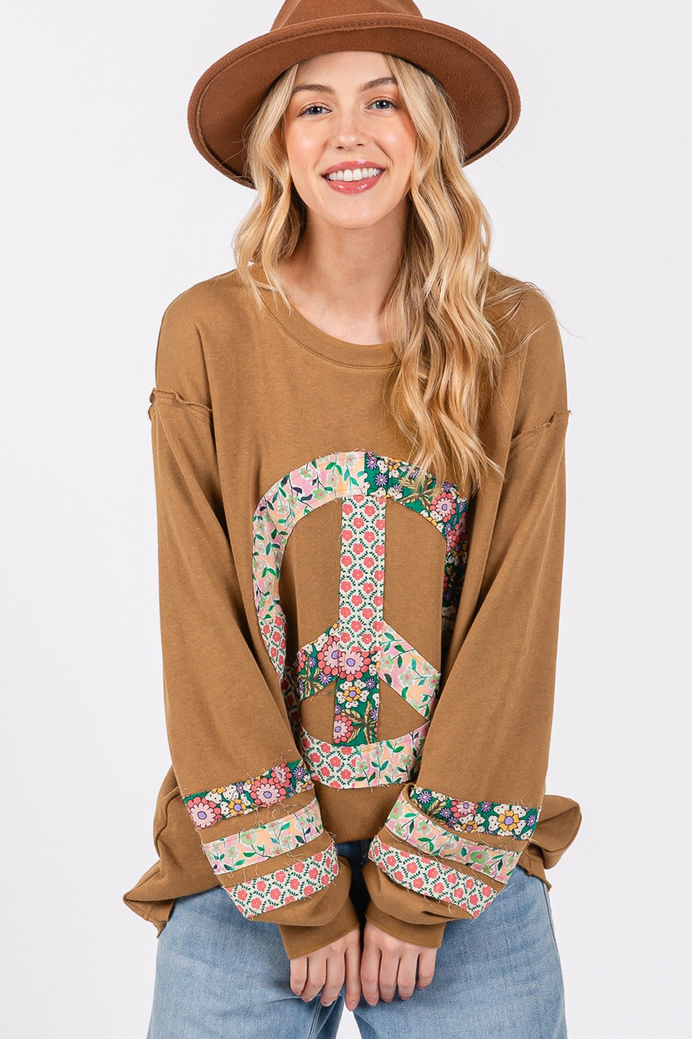Oversized Long Sleeve Shirt- - Calm & Cool Crochet Peace Sign Top. Are you a free- spirited gal, who likes a playful, relaxed, oversized style you can feel comfortable in that sends a peaceful vibe? This long sleeve shirt has banded cuffs and crochet to give your outfit unique features.
100% cotton. bronze.