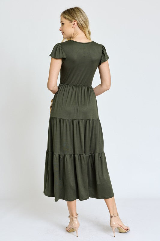 This Solid Flutter Sleeve Tiered Tea Length Dress was designed with you in mind!
Step into a thoughtfully designed dress to complement your curves and highlight your natural beauty. The soft, stretch fabric hugs in all the right places, offering all-day comfort taking you confidently from morning to night. Whether you are enjoying a garden party, or having a casual afternoon out, this dress has the versatility to be that go-to for many types of events.