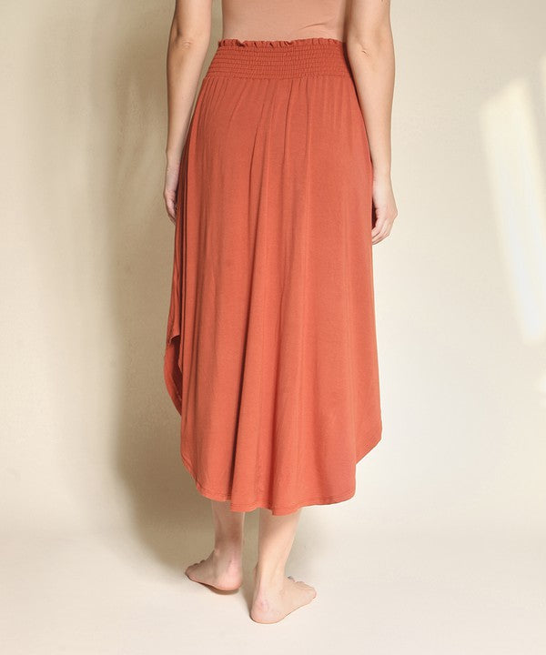Experience ultimate comfort and effortless style with our luxurious Organic Bamboo Maxi Skirt. Crafted from a dreamy blend of organic bamboo and soft, stretchy spandex, this skirt offers an incredible drape and moves with you, offering a flattering fit that feels as good as it looks. The smocked elastic waist hugs gently, giving you all-day ease, while the flowing silhouette adds a graceful, boho touch to any outfit. This is a savvy choice for those who are eco-friendly or have skin conditions.