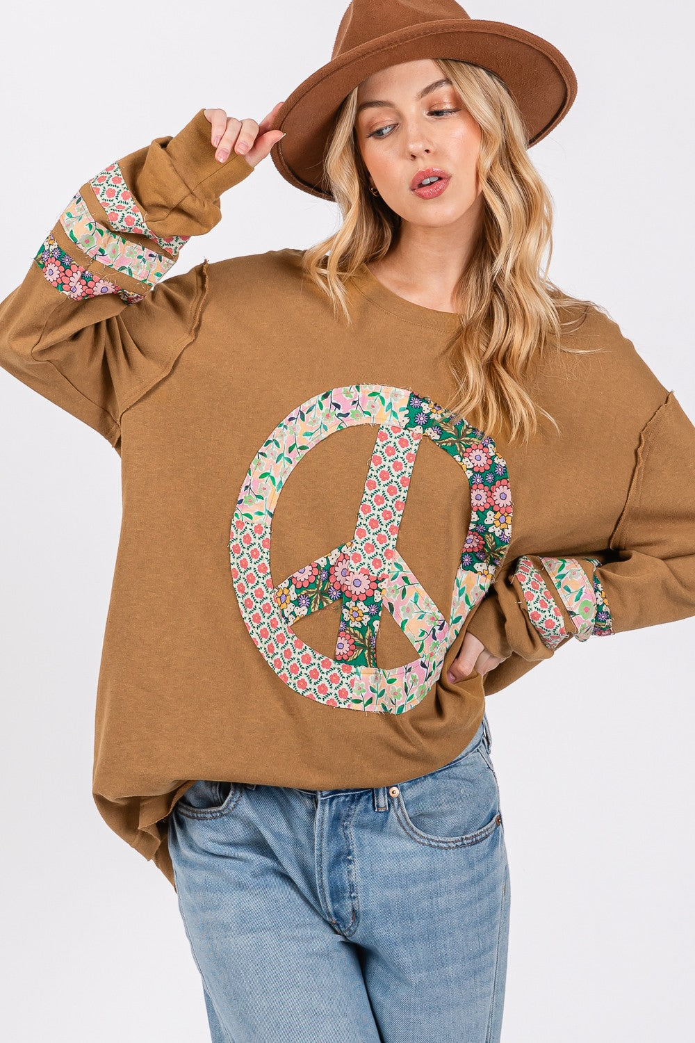 Oversized Long Sleeve Shirt- - Calm & Cool Crochet Peace Sign Top. Are you a free- spirited gal, who likes a playful, relaxed, oversized style you can feel comfortable in that sends a peaceful vibe? This long sleeve shirt has banded cuffs and crochet to give your outfit unique features.
100% cotton. bronze.