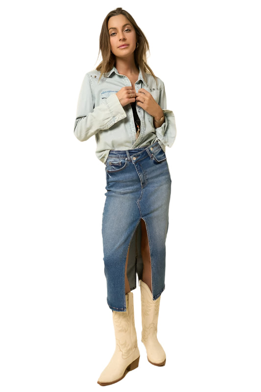 Get ready for your next event with this rustic jean skirt, with a flattering midi length that’s as comfy as it is stylish. The crossover design adds a modern twist while still keeping that fun, western spirit. Whether you're headed to a country concert, weekend market, or a casual night out with friends, this skirt has you covered.