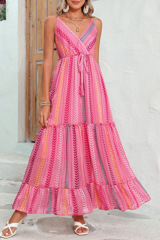 This tribal-print tassel dress solves the “what do I wear?” dilemma for day-to-night plans—lightweight, flowy, and full of wanderlust energy, it’s made for brunch dates, music fests, and golden hour magic.
Discover the stunning Tassel Boho Dress from Shop Free Soul Threads. With flowing tiers, a flattering V-neckline, and eye-catching tassel ties, this dreamy pink maxi dress adds a vibrant, free-spirited touch—that you will reach for again and again.