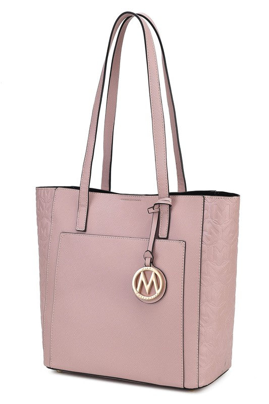 Sustainably Sleek Collection –Eco-Friendly Vegan Tote Bag. The Sustainability Sleek Collection is a unique collection that offers a WIN-WIN-WIN! Eco-Friendly Tote Bag is made with high quality Vegan Leather- Win!
This stylish tote looks like it came off the runway, but at a wallet friendly price point- WIN!
This versatile tote compliments working, travel, evenings out, and everyday wear. It's attention to detail and soft vegan leather conveys a polished look when you need it. Multiple colors available!