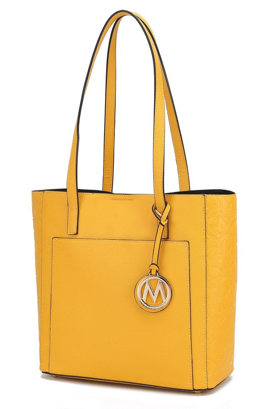 Sustainably Sleek Collection –Eco-Friendly Vegan Tote Bag. The Sustainability Sleek Collection is a unique collection that offers a WIN-WIN-WIN! Eco-Friendly Tote Bag is made with high quality Vegan Leather- Win!
This stylish tote looks like it came off the runway, but at a wallet friendly price point- WIN!
This versatile tote compliments working, travel, evenings out, and everyday wear. It's attention to detail and soft vegan leather conveys a polished look when you need it. Multiple colors available!