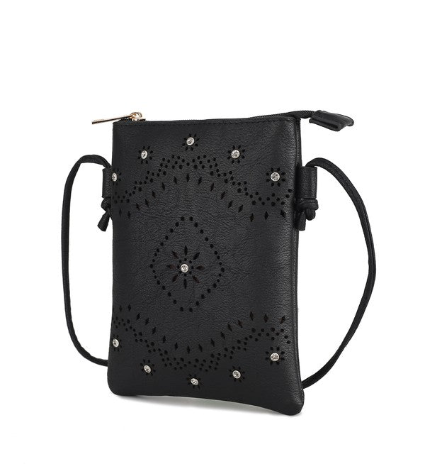 The Sustainable and Sleek Crossbody Bag works perfectly for days when much is not needed to carry to get through the day. Crafted with a supple soft Vegan leather material and gorgeous eyelet design. Roomy enough to fit a phone, keys, and a small wallet comfortably. This bag allows anyone to be hands-free and go about the day with ease and style.
