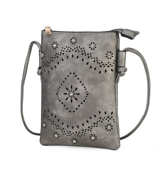 The Sustainable and Sleek Crossbody Bag works perfectly for days when much is not needed to carry to get through the day. Crafted with a supple soft Vegan leather material and gorgeous eyelet design. Roomy enough to fit a phone, keys, and a small wallet comfortably. This bag allows anyone to be hands-free and go about the day with ease and style.