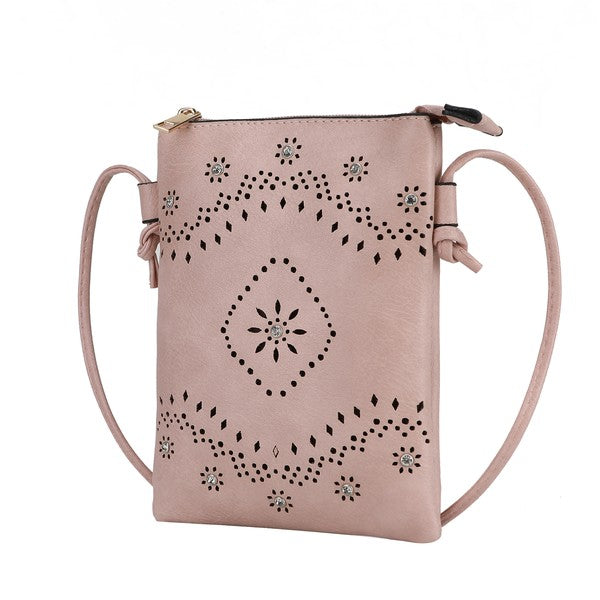 The Sustainable and Sleek Crossbody Bag works perfectly for days when much is not needed to carry to get through the day. Crafted with a supple soft Vegan leather material and gorgeous eyelet design. Roomy enough to fit a phone, keys, and a small wallet comfortably. This bag allows anyone to be hands-free and go about the day with ease and style.