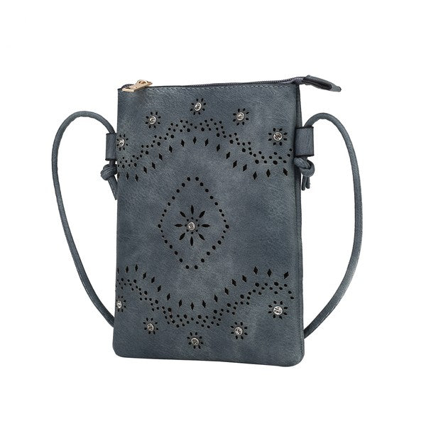 The Sustainable and Sleek Crossbody Bag works perfectly for days when much is not needed to carry to get through the day. Crafted with a supple soft Vegan leather material and gorgeous eyelet design. Roomy enough to fit a phone, keys, and a small wallet comfortably. This bag allows anyone to be hands-free and go about the day with ease and style.