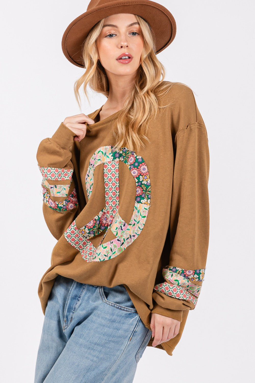 Oversized Long Sleeve Shirt- - Calm & Cool Crochet Peace Sign Top. Are you a free- spirited gal, who likes a playful, relaxed, oversized style you can feel comfortable in that sends a peaceful vibe? This long sleeve shirt has banded cuffs and crochet to give your outfit unique features.
100% cotton. bronze.