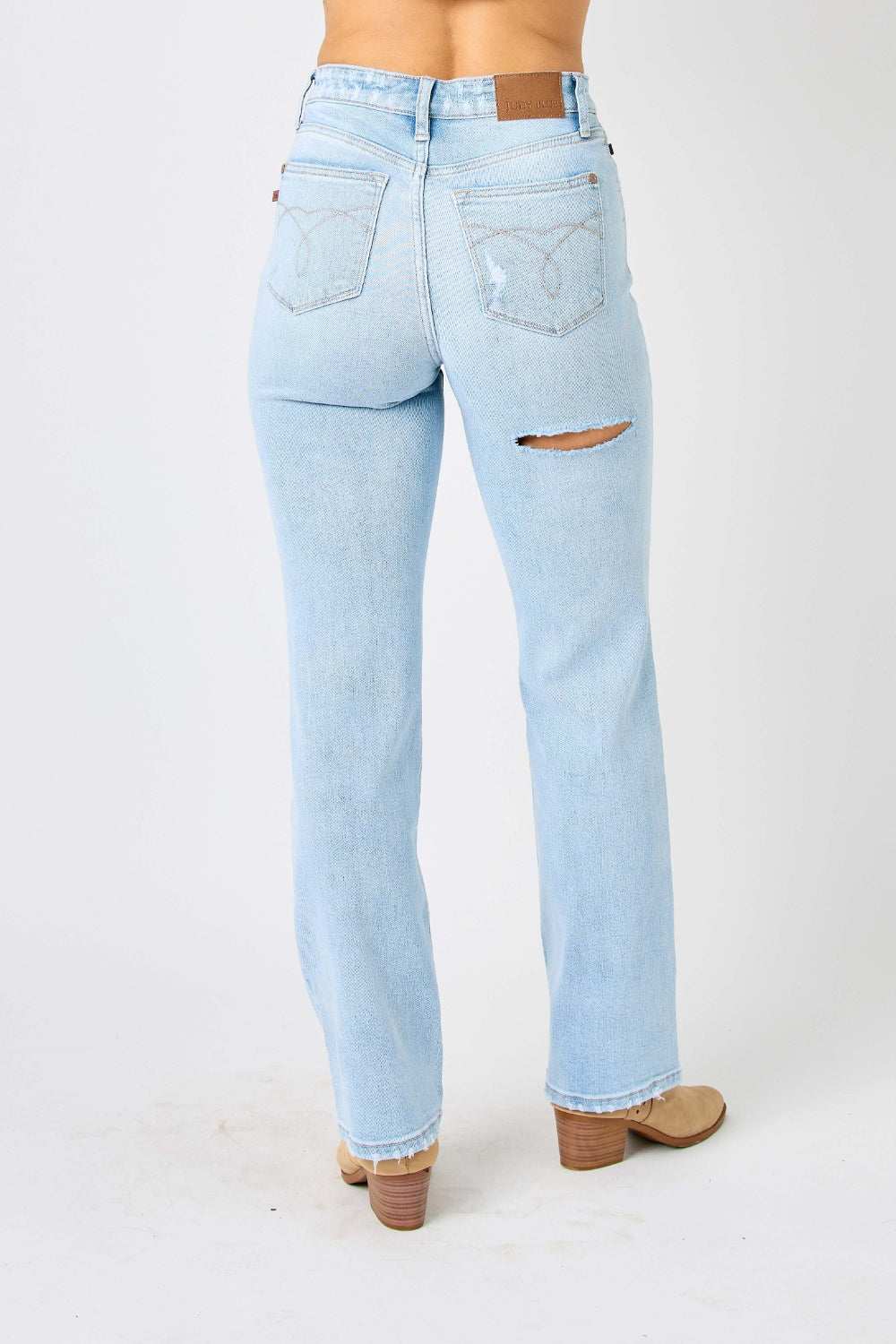 Judy Blue High Waist Jeans / distressed Jeans and Plus Sizes. Helps to conceal muffin tops. Light wash..