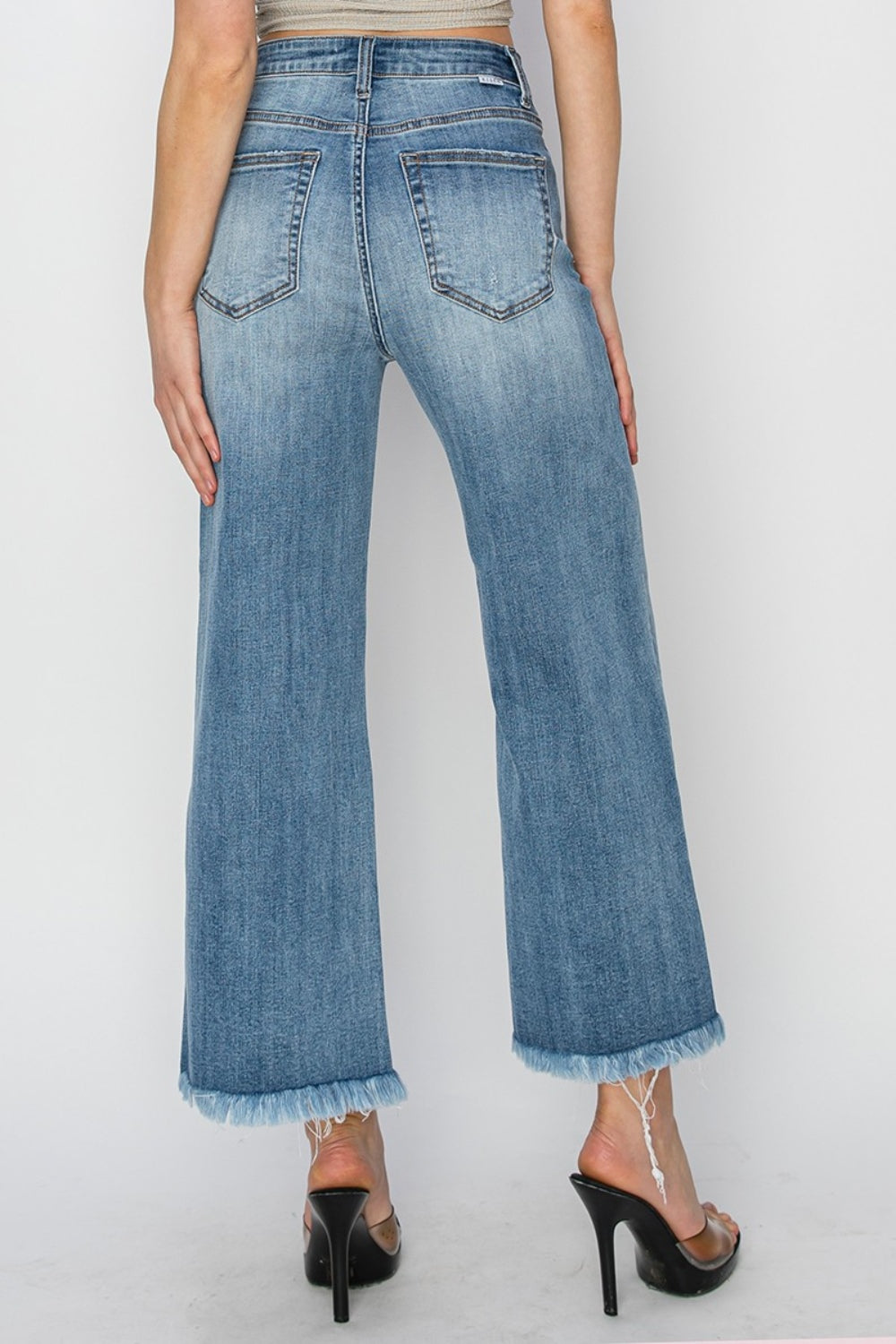 RISEN Wide Leg Jeans-Cropped Jeans- and Raw Hem with Plus Sizes - Boho Perfection. Your other jeans might get jealous.... these have high rise and wide leg and together they can be quite flattering and then add on the edginess of the raw hem detail.
They are a go to classic and have a modern look.. They could easily be your go-to jeans.. Light Wash.