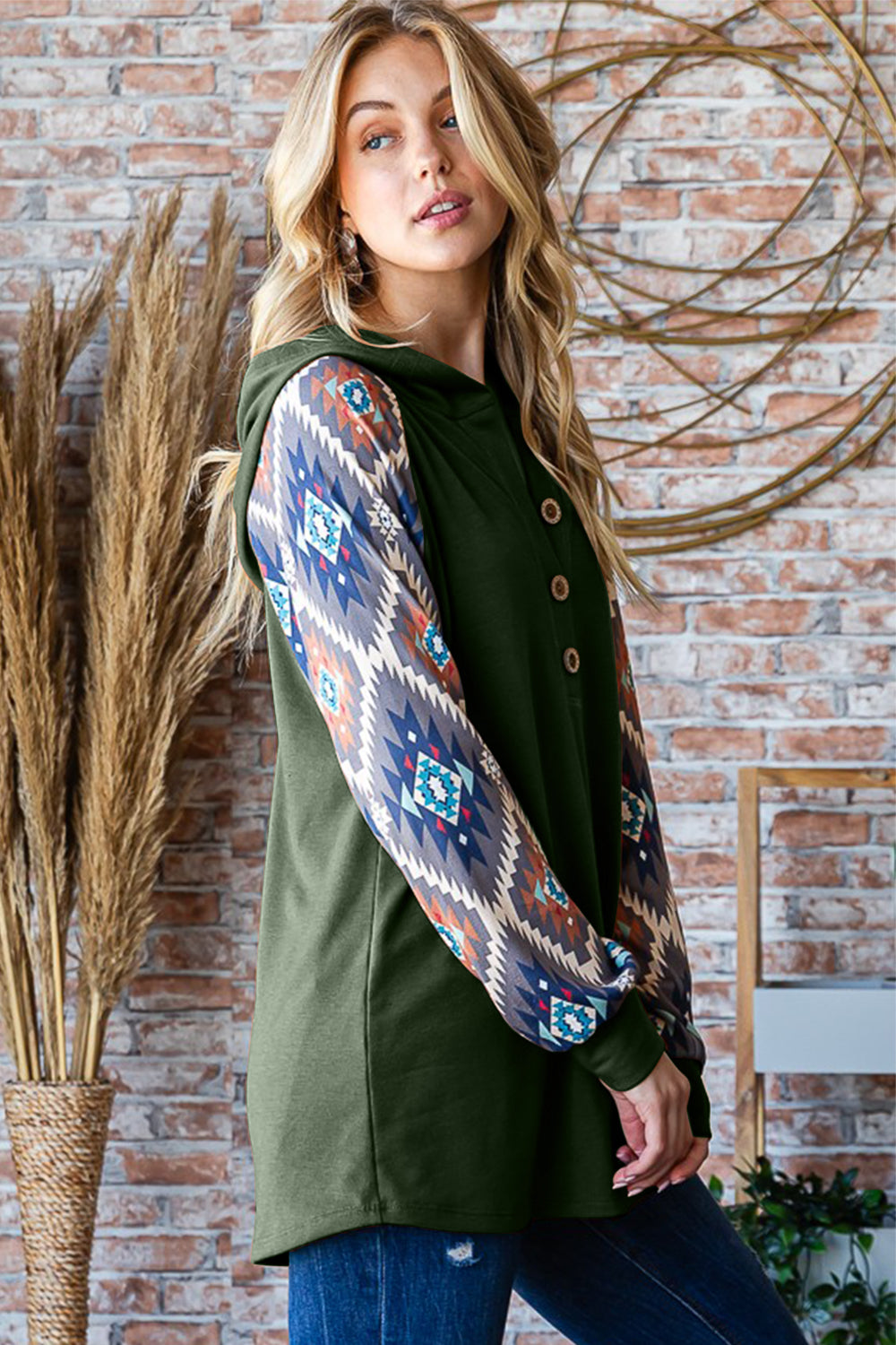 Long Sleeve Hooded Top with Aztec print. Olive Long Sleeve Remix with Plus Size. This shirt is a total staff fav here at Free Soul Threads! We couldn’t resist grabbing ours—make sure you snag yours before they’re gone! Limited sizes available, so don’t wait!