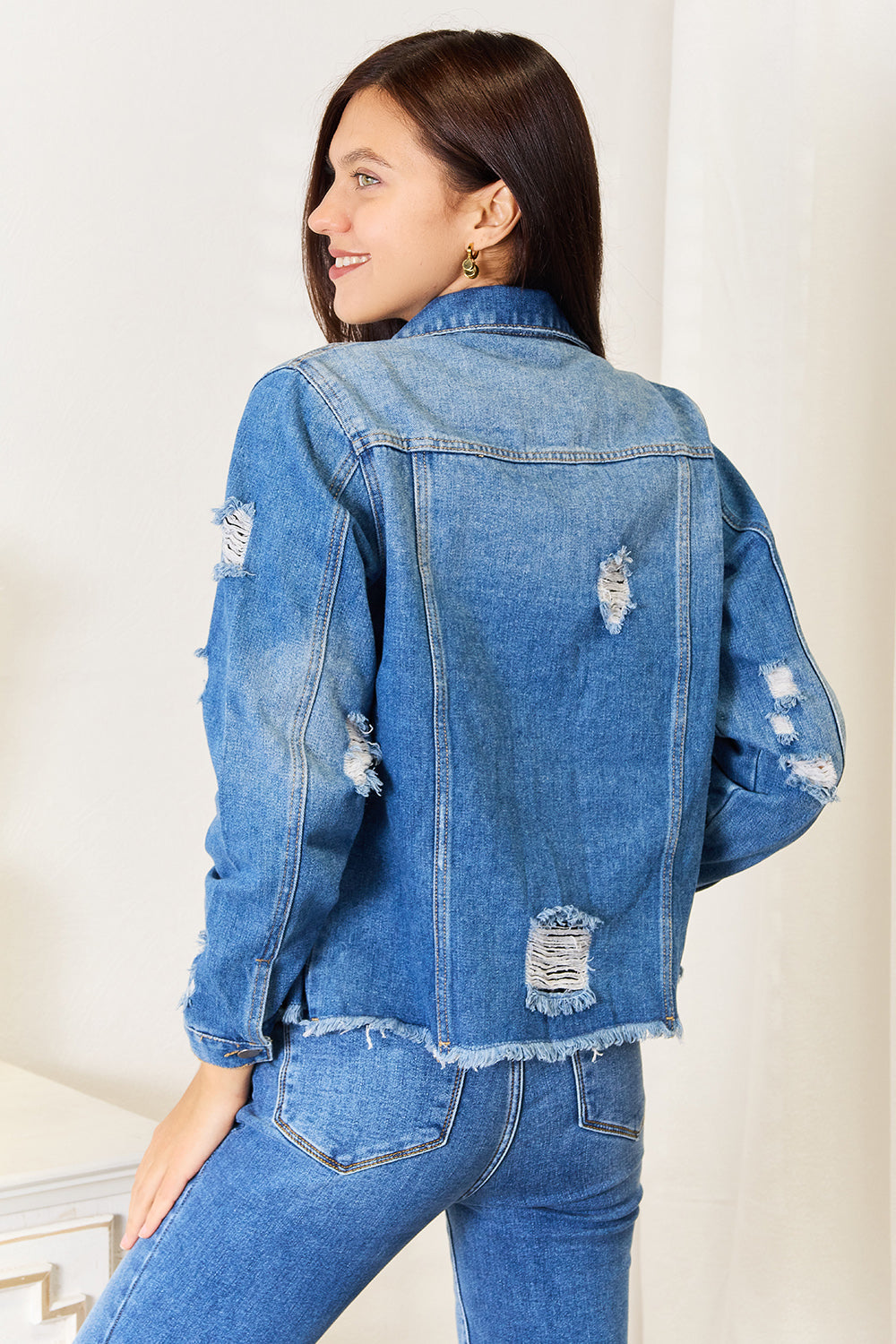 Distressed Denim Jacket/ Leopard and Floral Print Denim with Raw Hem AND Plus Sizes. effortlessly combines edginess and femininity and creates a vintage- inspired look. medium wash.