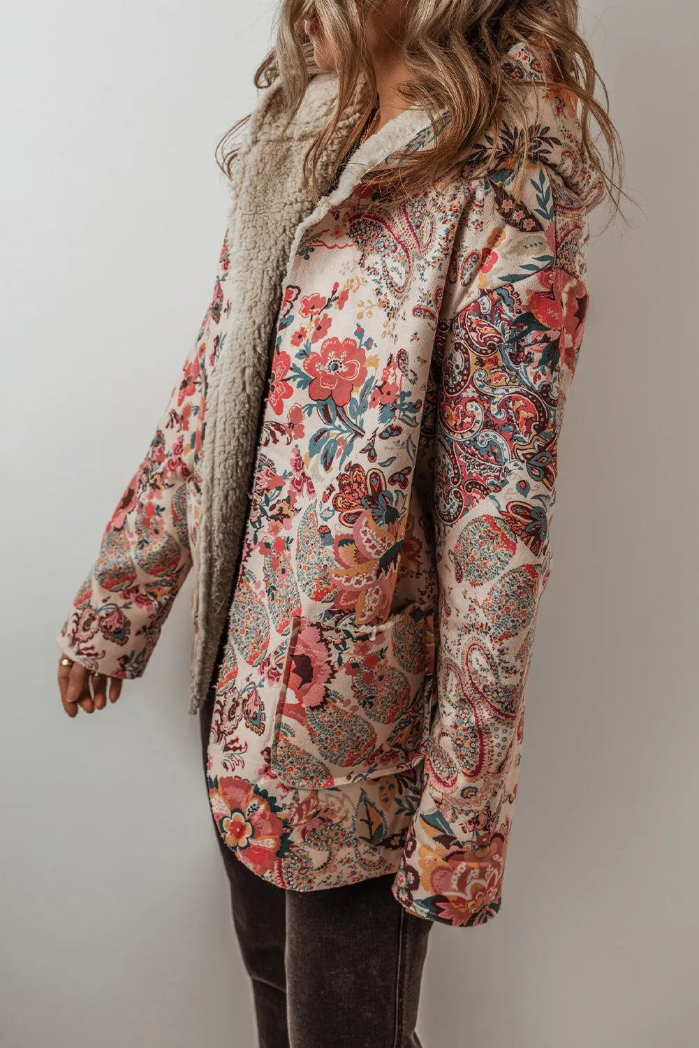 Women's Floral Jacket "Cozy in Bloom Double Take". This unique hooded jacket caught our eye! Yes, we looked twice. It is one of our products we call a "Double Take".... beautiful floral print jacket with vibrant colors that may cause some to do a "double take". Take a look at the lining. Not only will you be a standout, but you will also be cozy!