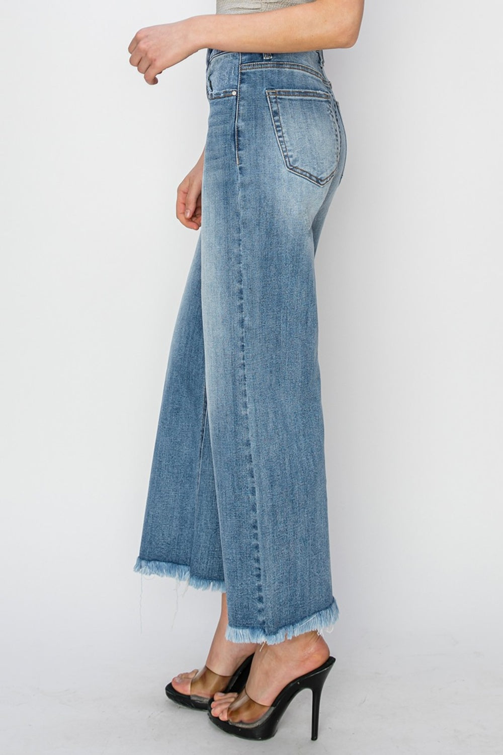 RISEN Wide Leg Jeans-Cropped Jeans- and Raw Hem with Plus Sizes - Boho Perfection. Your other jeans might get jealous.... these have high rise and wide leg and together they can be quite flattering and then add on the edginess of the raw hem detail.
They are a go to classic and have a modern look.. They could easily be your go-to jeans.. Light Wash.