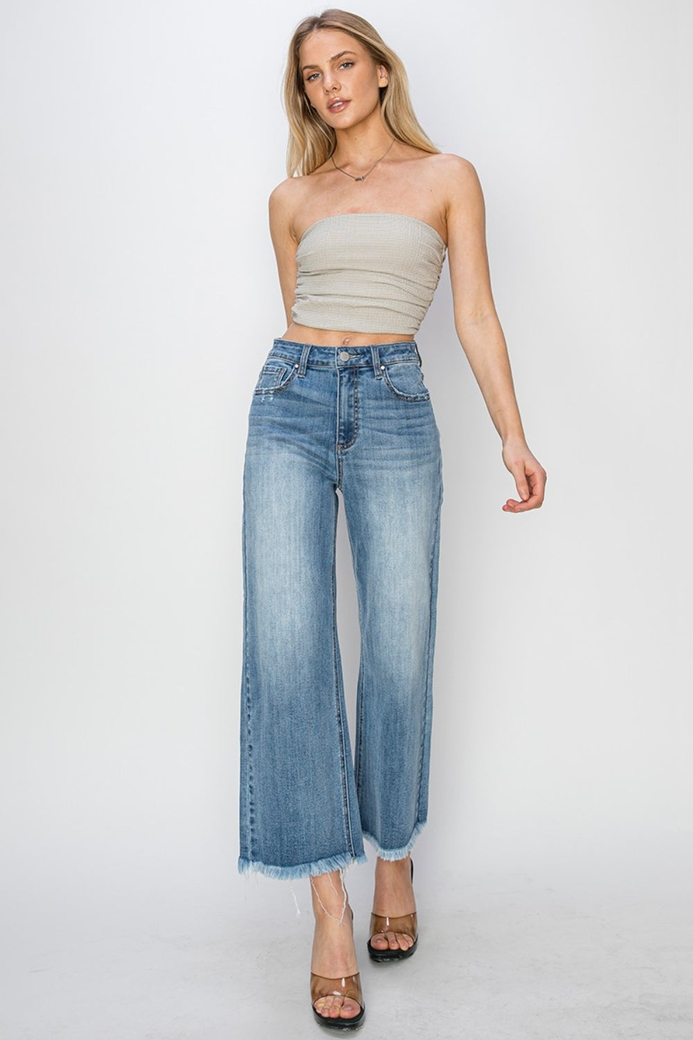 RISEN Wide Leg Jeans-Cropped Jeans- and Raw Hem with Plus Sizes - Boho Perfection. Your other jeans might get jealous.... these have high rise and wide leg and together they can be quite flattering and then add on the edginess of the raw hem detail.
They are a go to classic and have a modern look.. They could easily be your go-to jeans.. Light Wash.
