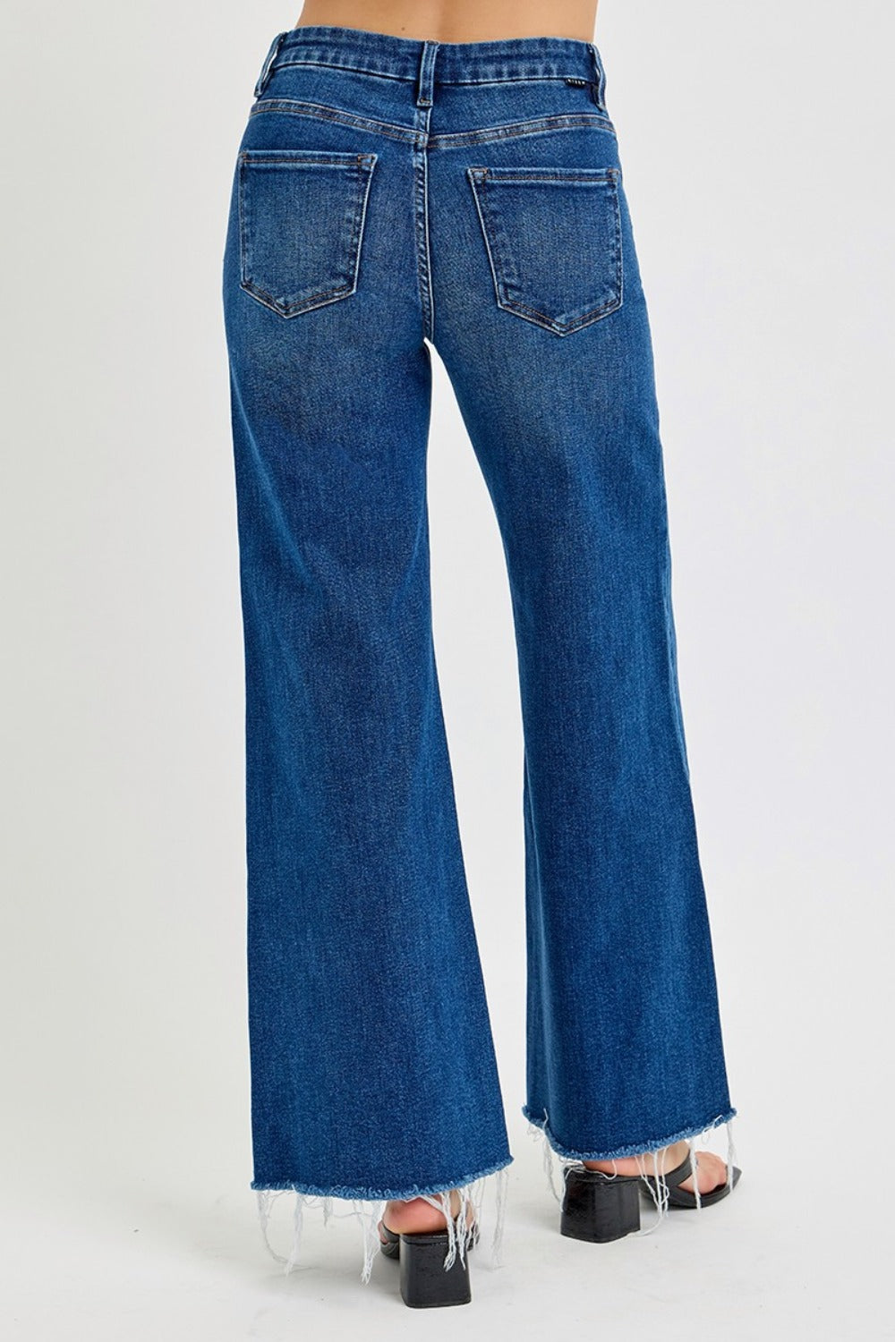 ISEN Tummy Control High Waisted Wide Leg Jeans with Stretch -Holy Grail. Are you tired of form fitting skinny jeans? Looking for a refreshing change; These tummy control wide leg jeans should do the trick.... offering a relaxed and laid-back feel! These will be your go-to jeans if you prioritize comfort when going on a night out or keeping casual on the weekends. Between the stretch, the high waist, and wide legs you are looking at the Holy Grail addition to your jean drawer! Medium Wash.