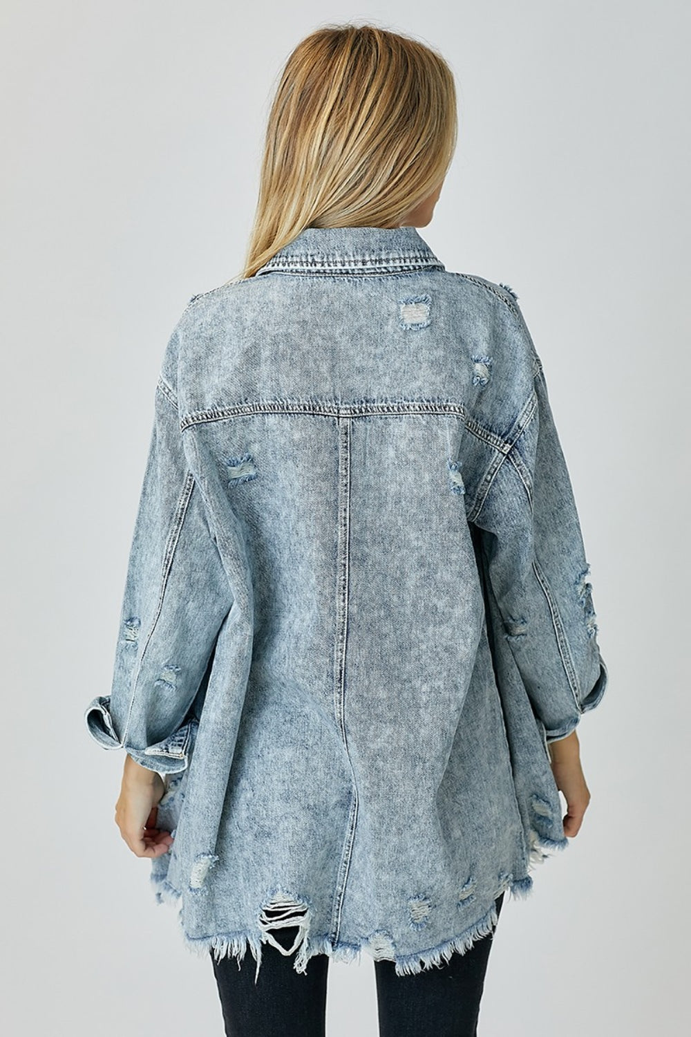 RISEN Distressed Raw Hem Denim Shirt - Vintage Inspired - Season Essential. One of Free Soul Thread's FAV's! Love this vintage distressed style and can picture it being a go to wardrobe essential with that boho laid back vibe! Don’t miss out – get yours before they're gone! Acid Wash