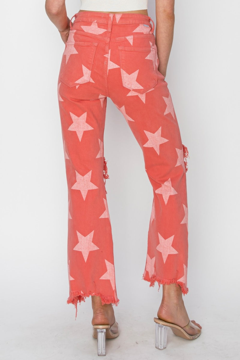 RISEN Distressed Raw Hem Star Pattern Jeans. Show off your unique personality! Color: Peach Blossom.