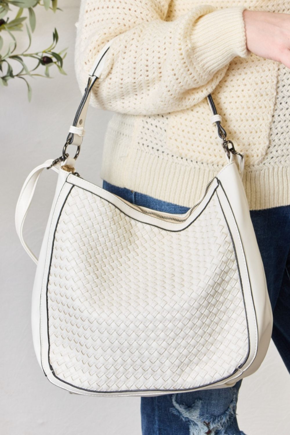 Weaved Vegan Leather Handbag- "Finally, a Bag That Gets You – Cruelty-Free, Boho, and Fabulous!"
advanced vegan leather: refers to a more sophisticated or high-quality alternative to traditional leather made without animal products; Vegan leathers that are crafted with innovative, sustainable materials or processes, designed to mimic the look, feel, and durability of real leather, but with a smaller environmental footprint.