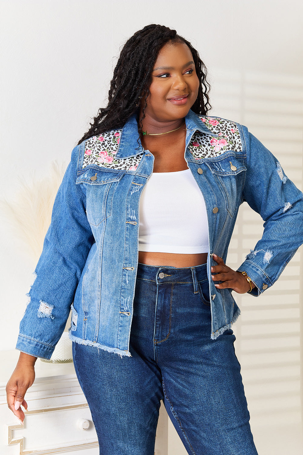 Distressed Denim Jacket/ Leopard and Floral Print Denim with Raw Hem AND Plus Sizes. effortlessly combines edginess and femininity and creates a vintage- inspired look. medium wash.