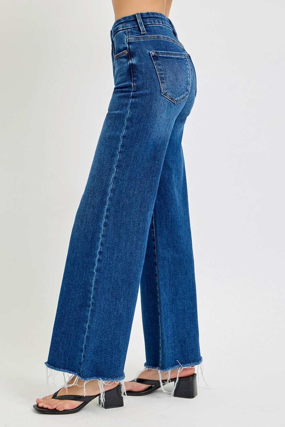 ISEN Tummy Control High Waisted Wide Leg Jeans with Stretch -Holy Grail. Are you tired of form fitting skinny jeans? Looking for a refreshing change; These tummy control wide leg jeans should do the trick.... offering a relaxed and laid-back feel! These will be your go-to jeans if you prioritize comfort when going on a night out or keeping casual on the weekends. Between the stretch, the high waist, and wide legs you are looking at the Holy Grail addition to your jean drawer! Medium Wash.