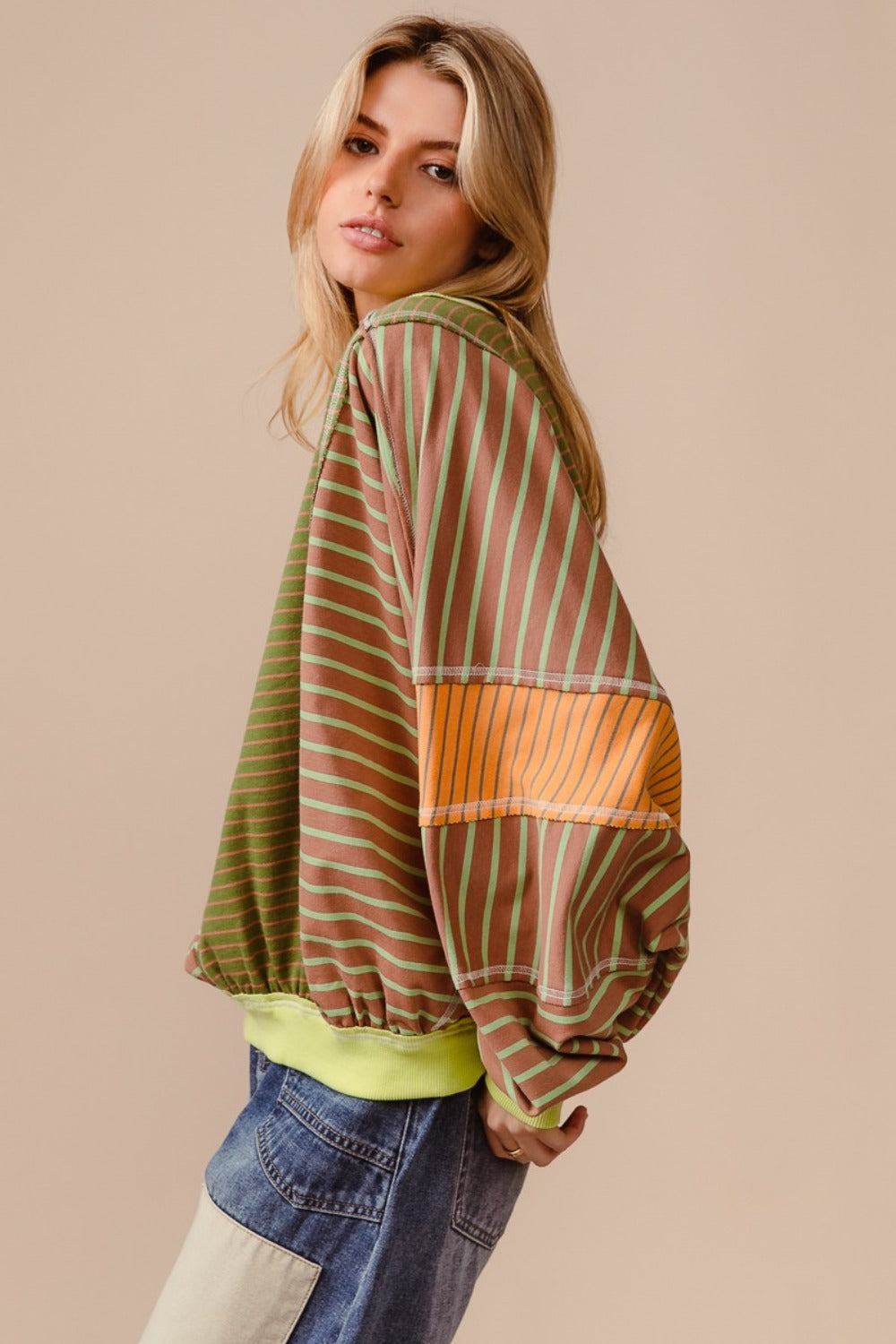Oversized Sweatshirt -The Bold Mix Sweatshirt – Dare to Be Different. Bold, vibrant, and impossible to ignore—this oversized color block and striped sweatshirt is made for the free spirit who isn’t afraid to stand out. With its striking mix of daring hues, it’s more than just a sweatshirt; it’s a statement. Whether you're layering it or rocking it solo, this eye-catching piece is sure to turn heads and add energy to any look. Don’t wait—this one will move fast, and you won’t want to miss out on this!
