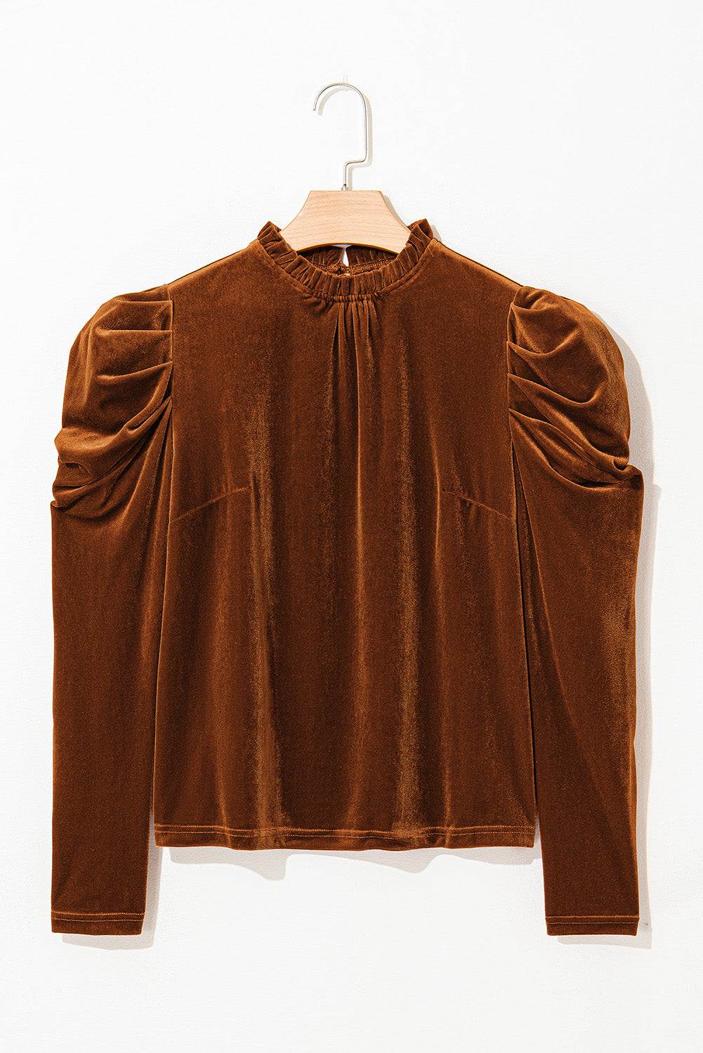 his beautiful chestnut mock neck top dials up your boho style with plush velvet fabric and romantic vibes. The soft, lustrous fabric adds a touch of sophistication, making it perfect for both casual outings and dressed-up occasions.