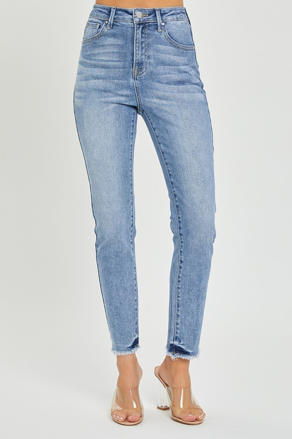 RISEN High Rise Skinny Jeans Frayed Hem with Plus Sizes 0-3x. Comfortable versatile pair of women's high rise skinny jeans perfect to show off your curves! Light Wash.