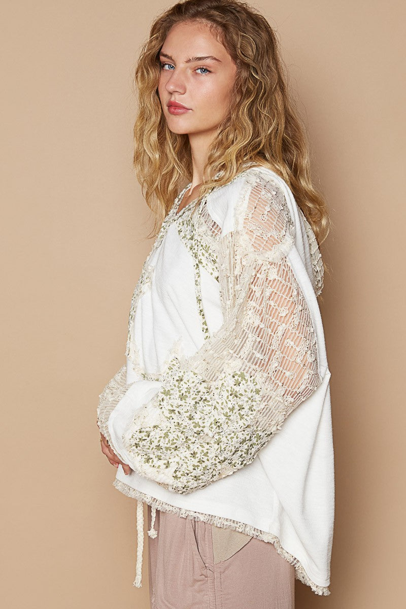 Whimsical Star Patch Hooded Shirt - A Feminine Twist on Rebel Style - Ivory Multi. Does it feel sexy to be edgy and feminine at the same time? You got it! This star print adds some whimsy, and the lace contrast gives a delicate and elegant touch to the design. We love the mixed textures, making this top perfect for both casual and dressed-up looks.