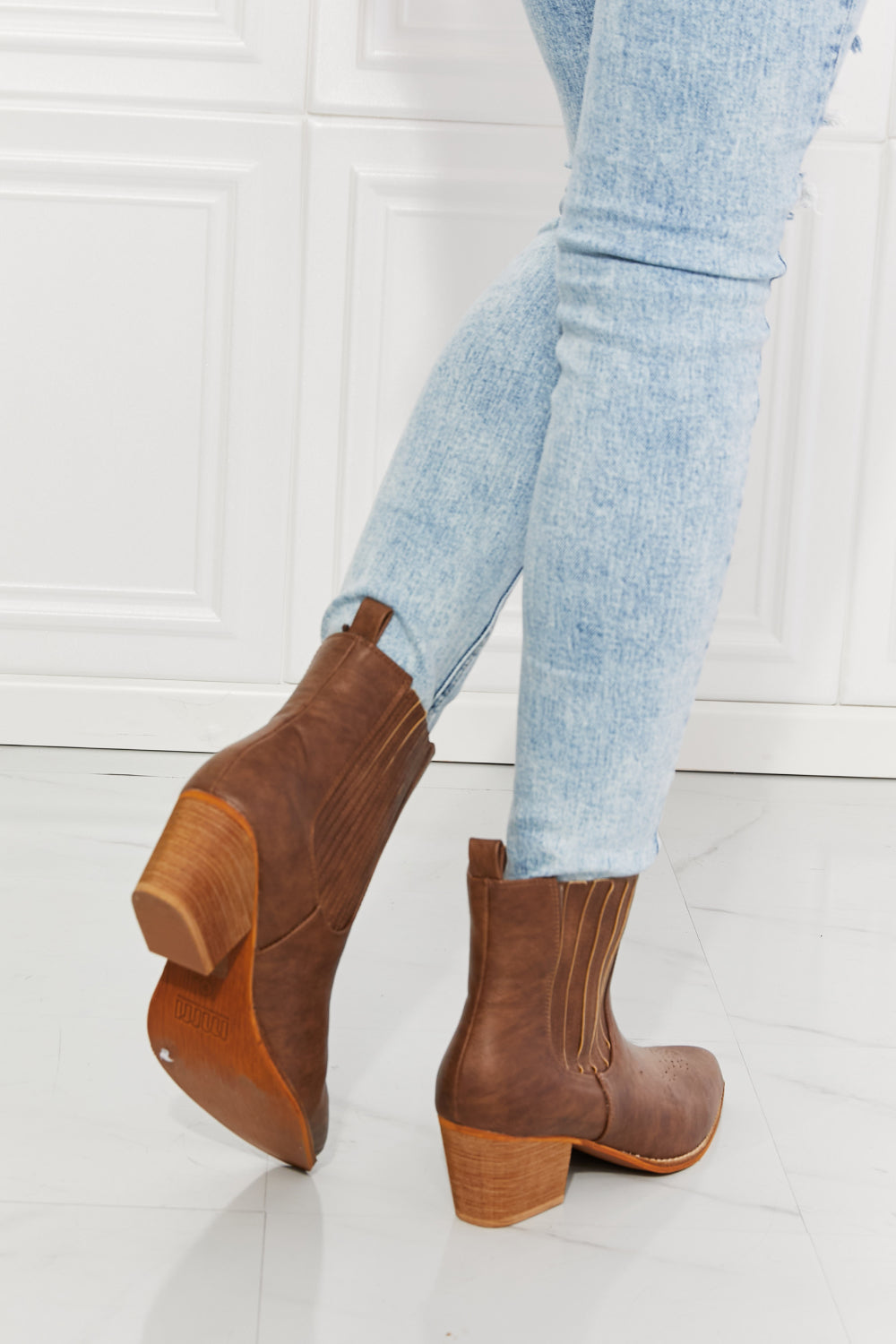 These boots are a balancing act between cowboy boots and Chelsea boots, featuring details of each style. They have a high-top and a stacked heel, as well as an elevated Chelsea panel and pointed toe. You can rock these stacked boots a pair of jeans, a leather jacket, or even a sharp suit. And with their sturdy construction and timeless design, these boots aren't just an accessory—they're an investment in style.