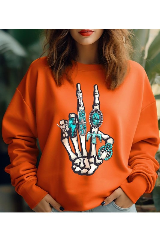 This is a fun year-round graphic sweatshirt with skeleton hand styled with western turquoise jewelry. Comes in multiple colors! Just pick your FAV!