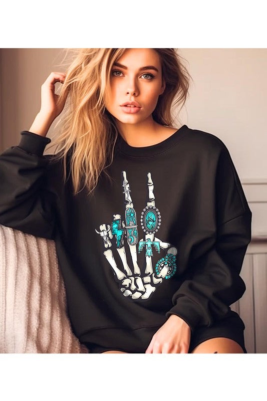 This is a fun year-round graphic sweatshirt with skeleton hand styled with western turquoise jewelry. Comes in multiple colors! Just pick your FAV!