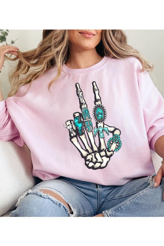 This is a fun year-round graphic sweatshirt with skeleton hand styled with western turquoise jewelry. Comes in multiple colors! Just pick your FAV!
