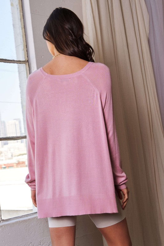 Pink Long Sleeve Top - Sparking Rhinestone Stars. Add a touch of sparkle and sophistication to your look with the High-Low Rhinestone Star Top – designed to make you shine with effortless elegance, and confidence, no matter the occasion.