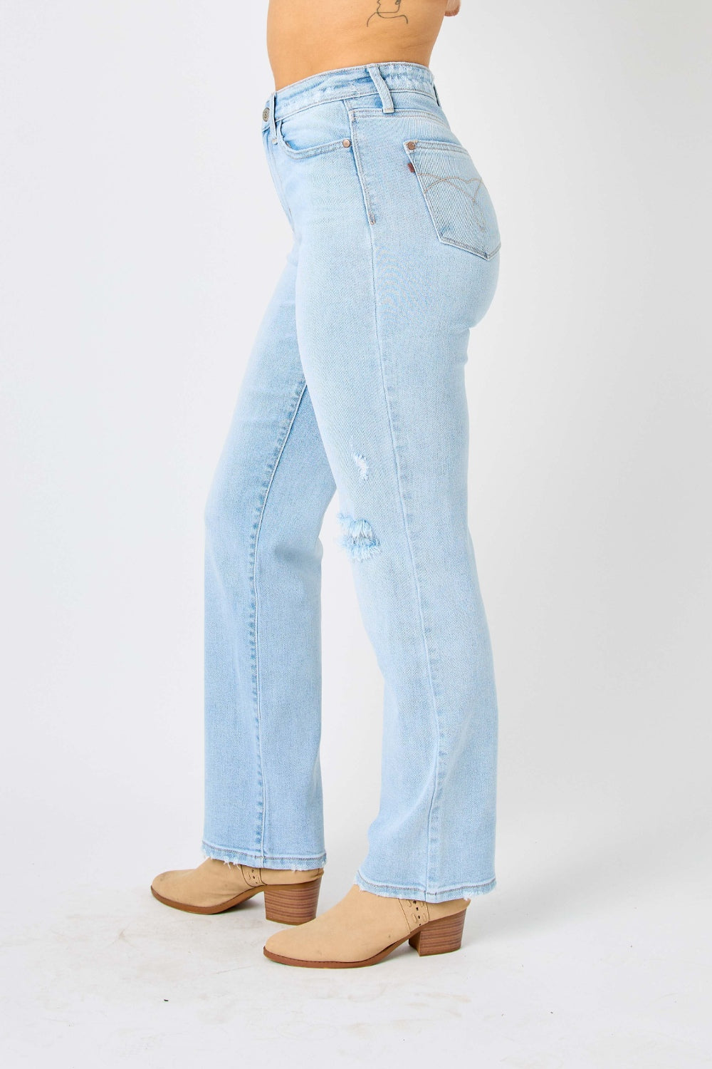 Judy Blue High Waist Jeans / distressed Jeans and Plus Sizes. Helps to conceal muffin tops. Light wash.