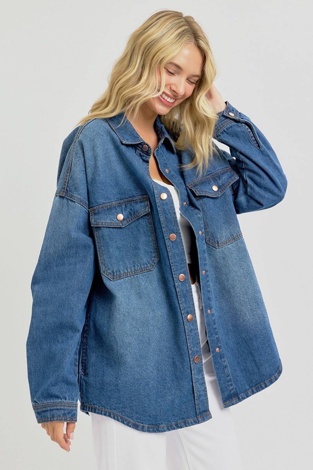 RISEN Denim Shacket - Snap Down Long Sleeve - Plus Sizes- LAYER MVP. The Denim Shacket (hybrid shirt/jacket) is perfect when you think "It's cold, but not THAT cold". Meet the MVP of fall layering right here. 100% Cotton. Medium wash.