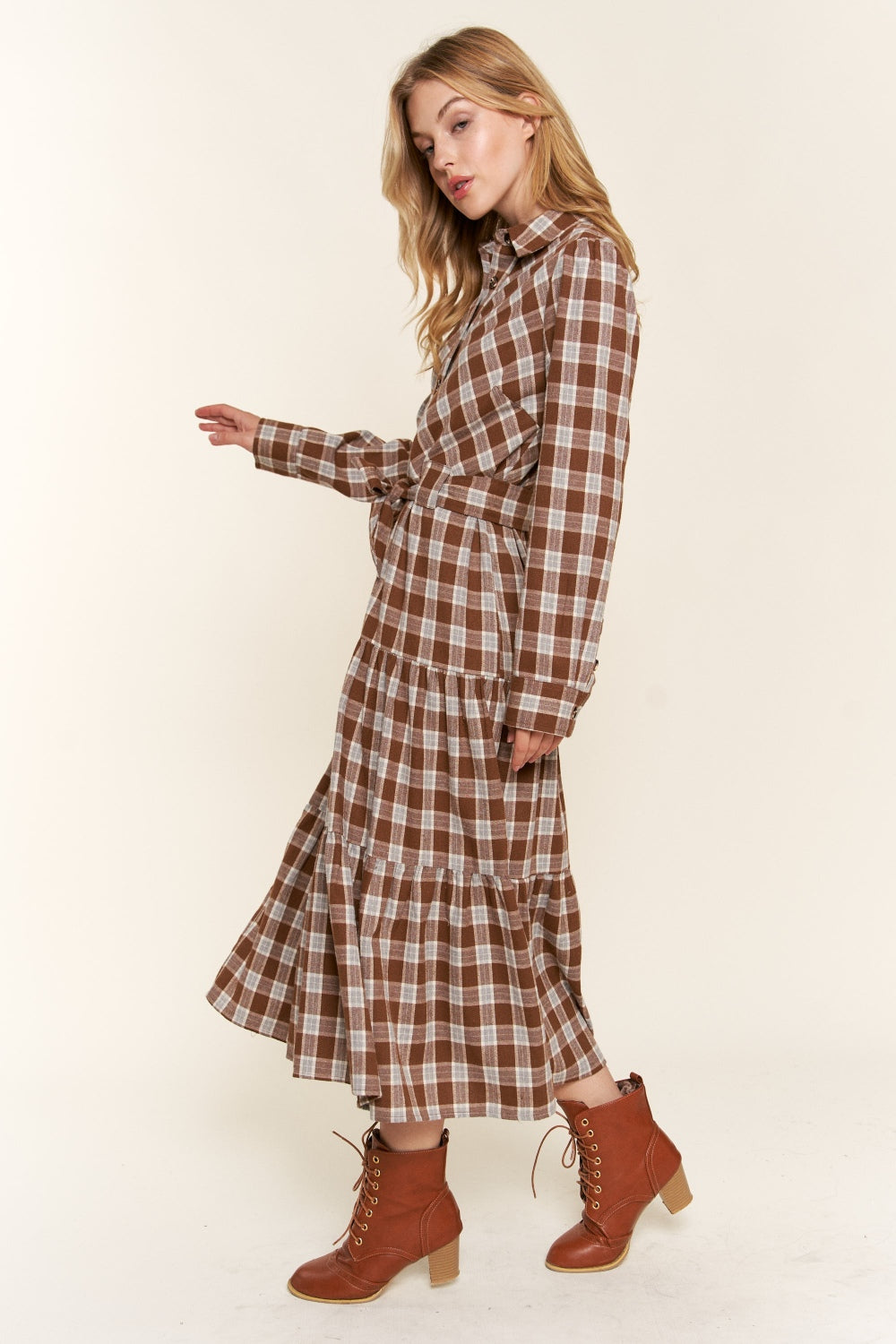 Tiered Midi Shirt Dress -Plaid to Meet You. If you're drawn to the dreamy world of boho, farmcore, or cottagecore, this feminine, prairie-style plaid dress is calling your name. Picture this: flowy fabric that feel like a gentle breeze, vintage-inspired details that make you feel like you've stepped out of a secret garden, and a timeless plaid pattern that just never goes out of style.