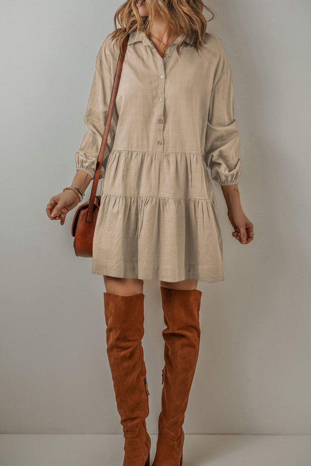 Feel the way this dress moves, (loose and flowy) and you will feel ready to start your day! The tiered style and army green creates a flattering dress that is equal parts free-spirited and laid-back western. The textured ruching along the seams creates a subtle, rippling effect that adds a touch of character to the flowy silhouette. Balloon sleeves bring a playful, whimsical vibe. Designed for comfort and breathability, this dress is perfect for those sunny afternoons or casual get-togethers.