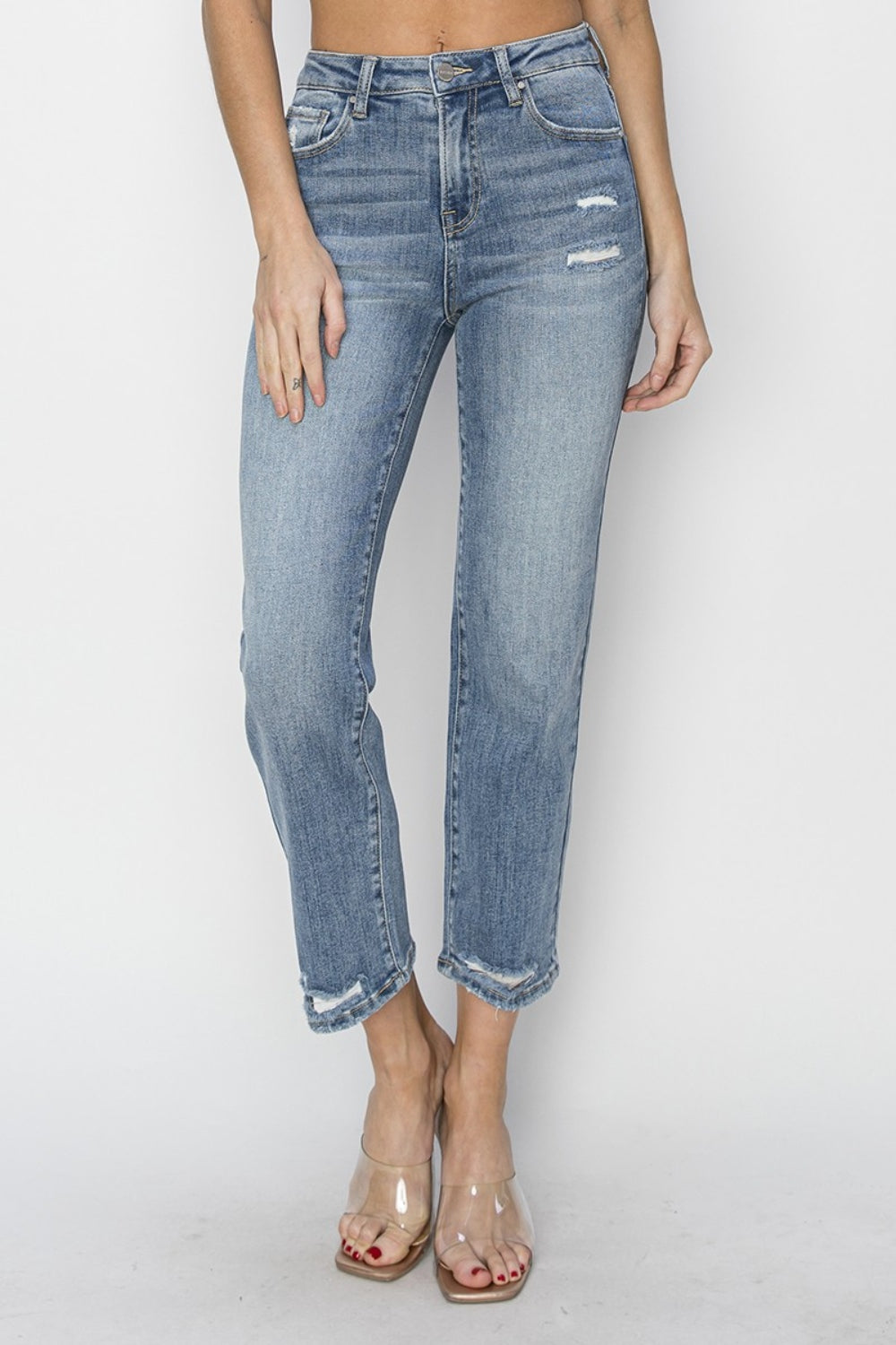 RISEN High Waist Distressed Cropped Jeans- Your Boho Canvas. These are the perfect jeans to express your individuality and your free-spirited creativity! Dive in to curating your unique bohemian look and celebrate self-expression with these jeans as your canvas! medium wash.