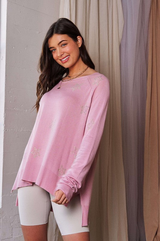 Pink Long Sleeve Top - Sparking Rhinestone Stars. Add a touch of sparkle and sophistication to your look with the High-Low Rhinestone Star Top – designed to make you shine with effortless elegance, and confidence, no matter the occasion.