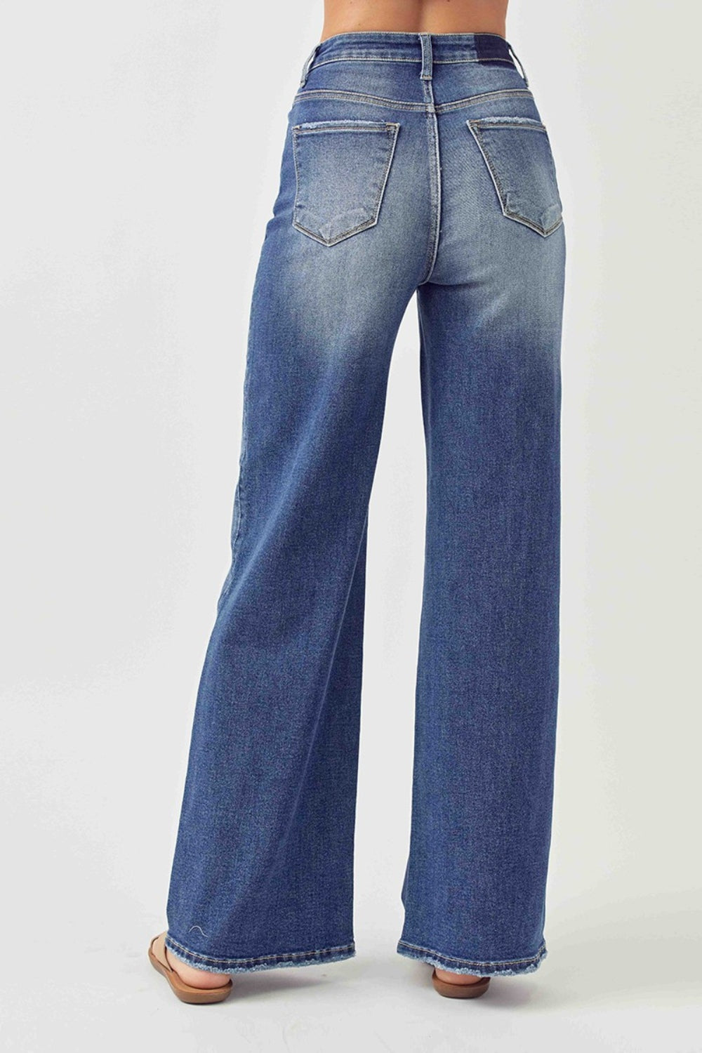 Risen Wide Leg High Rise Jeans with Plus Sizes. A must have boho essential pair of jeans! Wide Leg, High Rise jeans are go-to jeans for any look, any day of the week! Effortless pairing all year long with your boho blouses! Snag you pair before they disappear! Medium wash.
