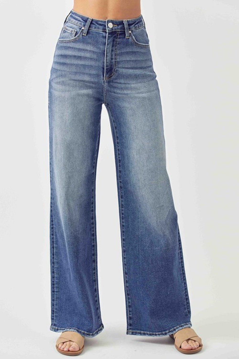Risen Wide Leg High Rise Jeans with Plus Sizes. A must have boho essential pair of jeans! Wide Leg, High Rise jeans are go-to jeans for any look, any day of the week! Effortless pairing all year long with your boho blouses! Snag you pair before they disappear! Medium wash.