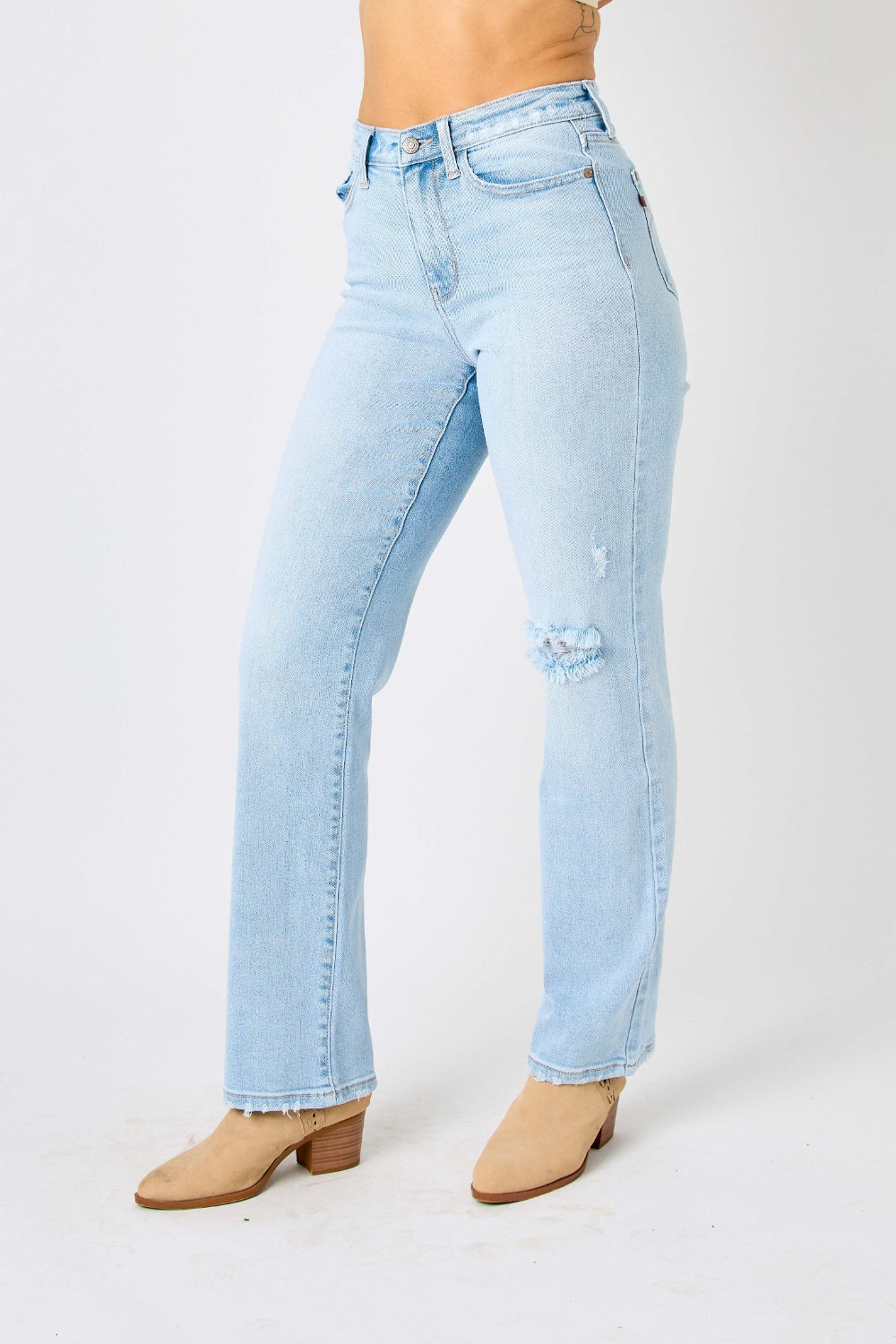 Judy Blue High Waist Jeans / distressed Jeans and Plus Sizes. Helps to conceal muffin tops. Light wash.